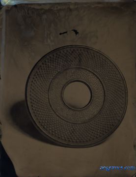 wet plate collodion print on aluminum of Japanese iron trivet