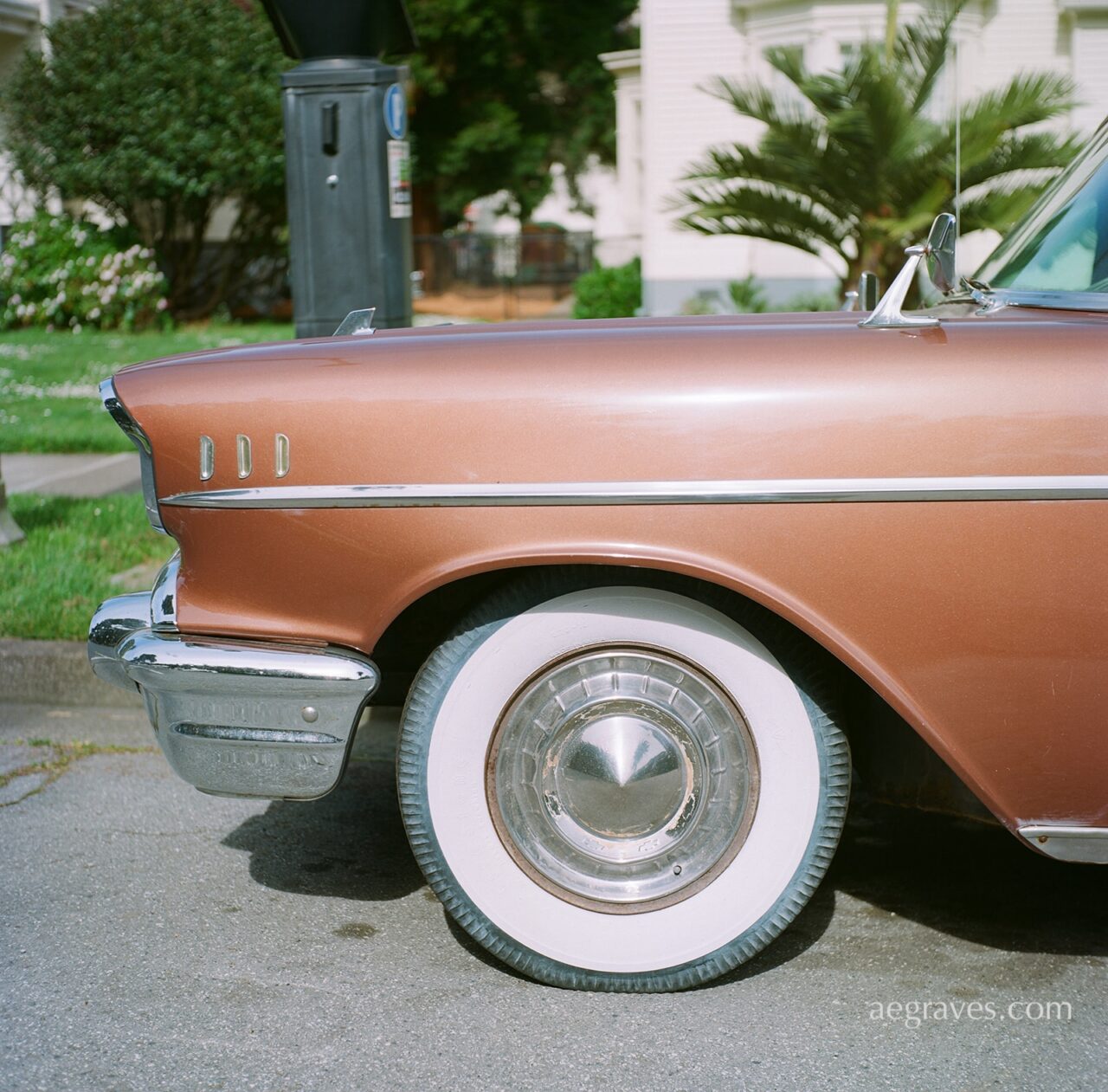 Front left fender of a classic Cadillac in pearl fawn
