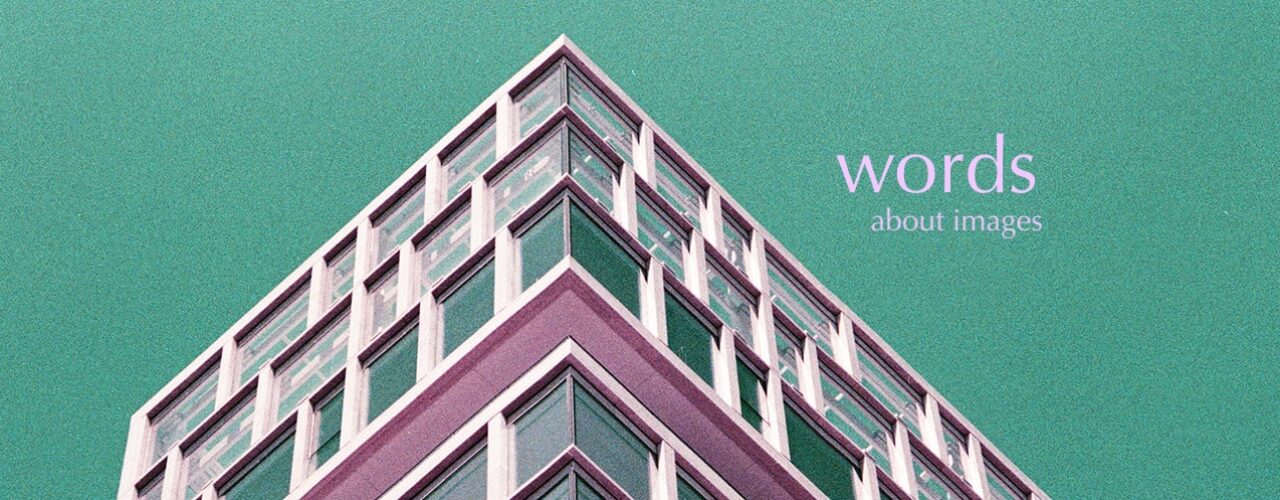 Teal, gray, and violet profile of a heavily articulated building