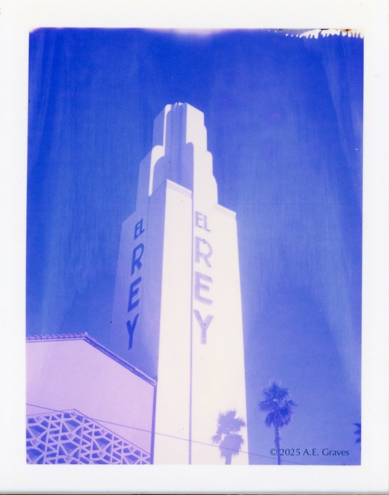 Blue toned image of the El Rey Theater Tower and facade, 2025