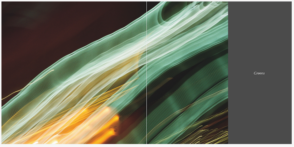 Two page photo spread of green and gold light streaks on a deep gray page in Lighttime by A.E. Graves