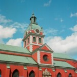 Vivid reds and bright copper patina shine under a bright Swedish sky Reddest reds