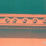 Orange and green image of stone wave details