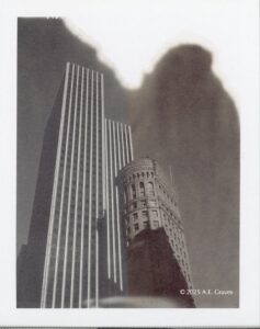 Polaroid Sepia image of the top of the Hobart Building plus a Modernist Friend